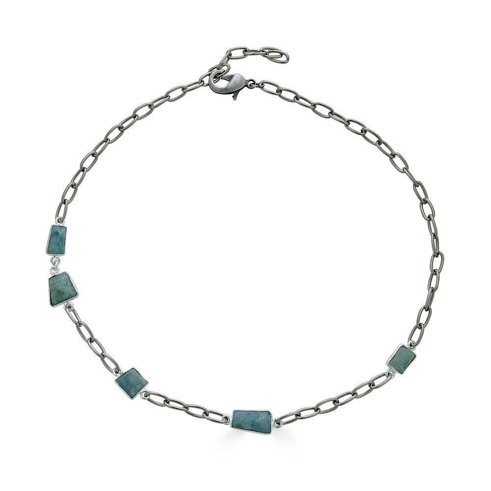 an asymmetrical aquamarine necklace