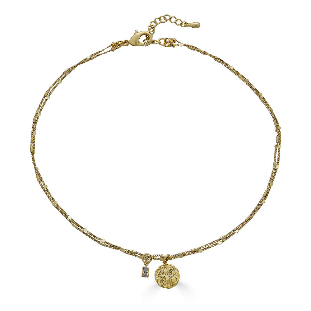 a gold hammered coin necklace