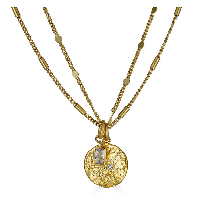 a gold hammered coin necklace