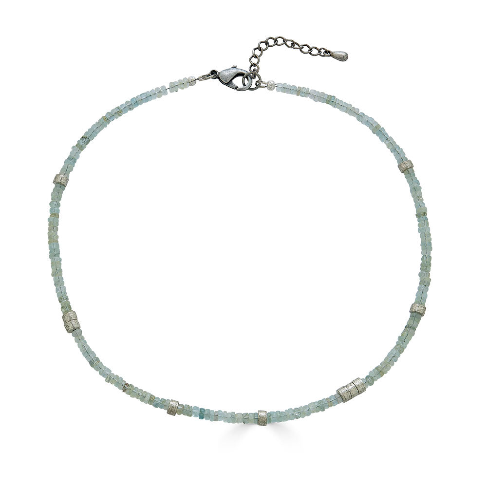 an aquamarine bead necklace with silver accents