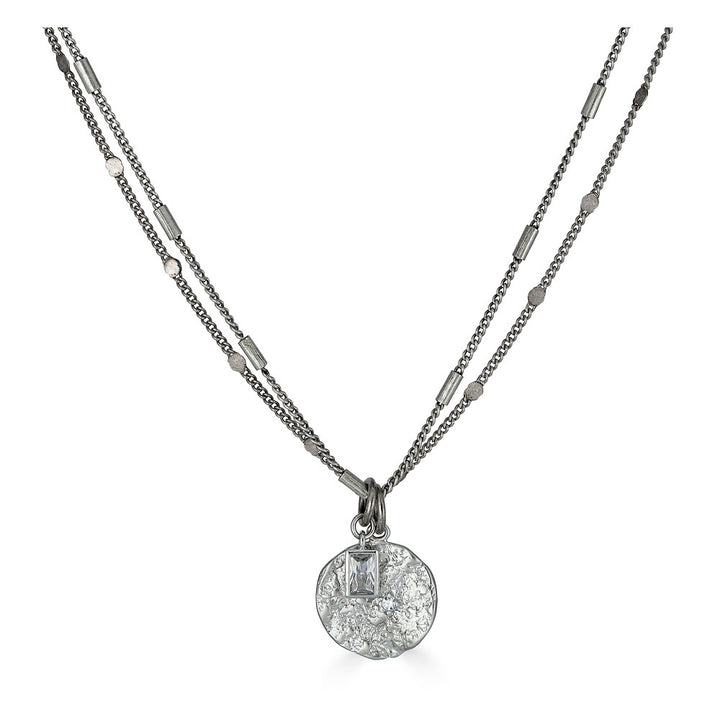 a silver hammered coin necklace